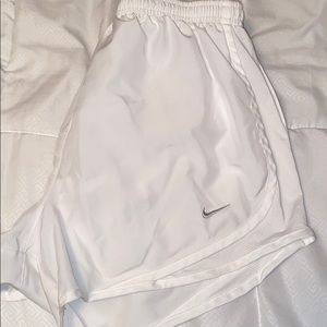 White Nike shorts